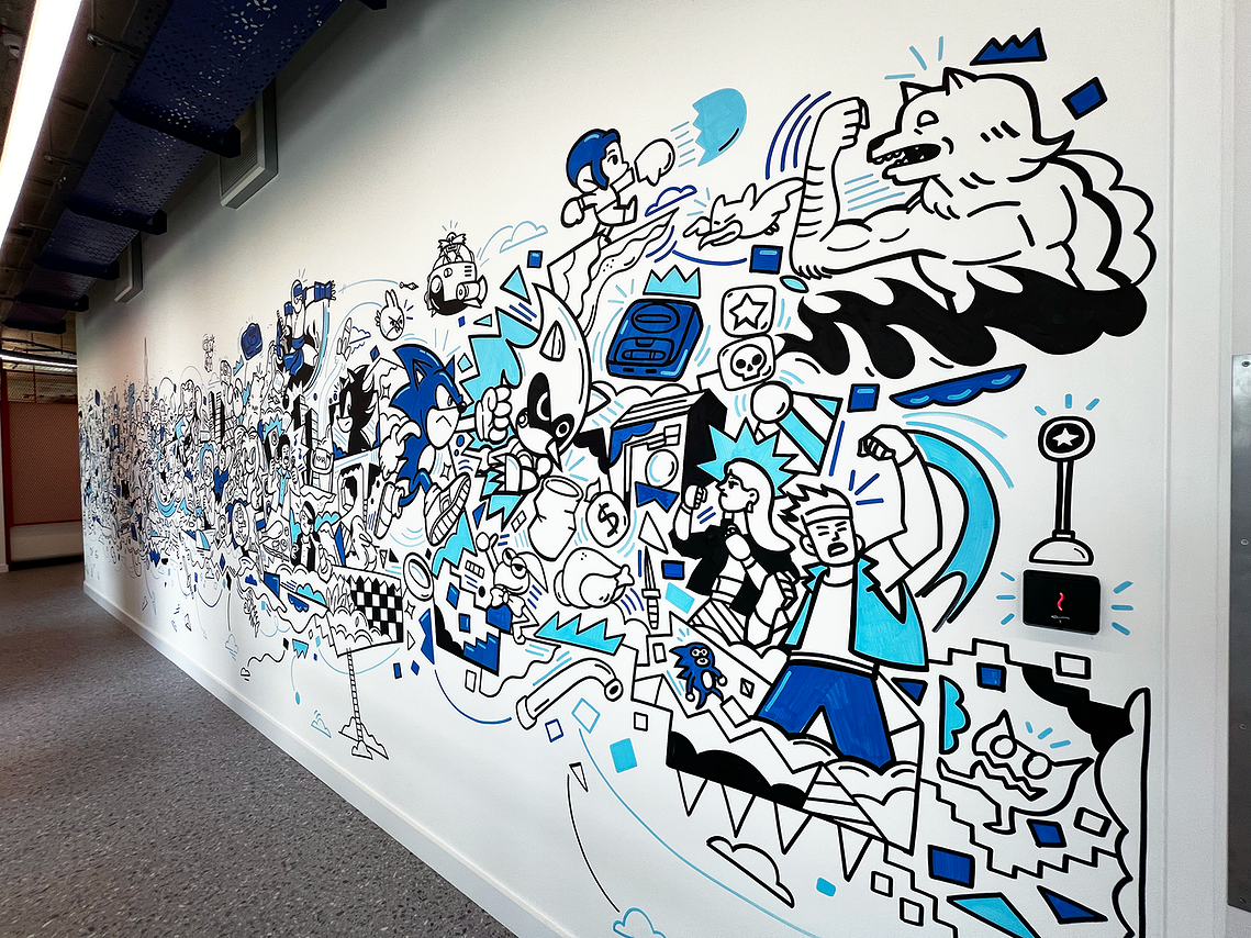 Illustrator Geo Law doodles a mural for Sega Europe in London featuring characters like Sonic the Hedgehog, Shinobi, Streets of Rage and more