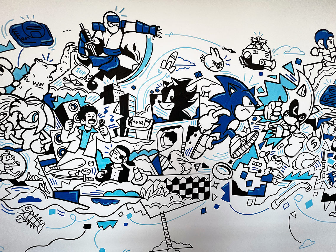Illustrator Geo Law doodles a mural for Sega Europe in London featuring characters like Sonic the Hedgehog, Shinobi, Streets of Rage and more