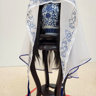 sculptural installation featuring hand embroidery and beadwork on a silk wedding veil.