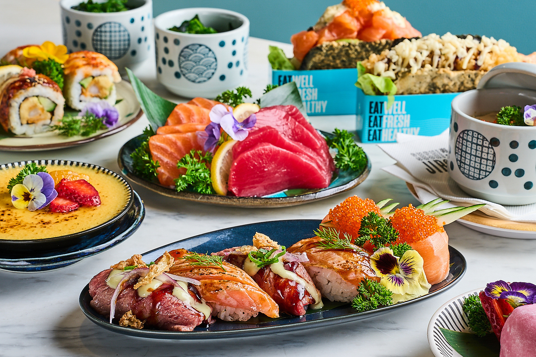 Colourful sushi spread and tea cups — Melbourne restaurant photography