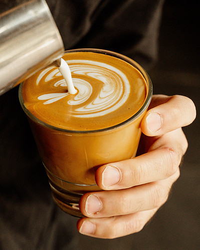 Latte art in progress – coffee lifestyle and branding photography by Marcie Raw, Melbourne