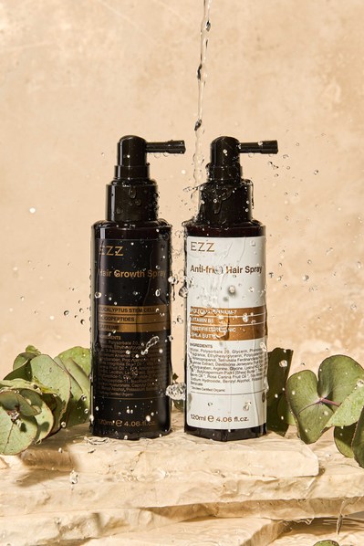 water dripping on two hair products bottles