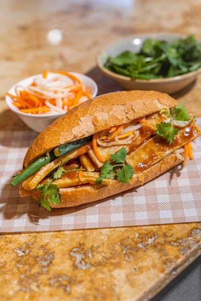 banh mi with fresh ingredients lying on the table