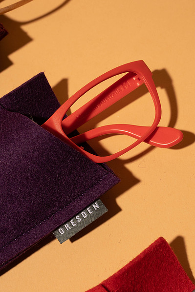 a close up of orange glasses 