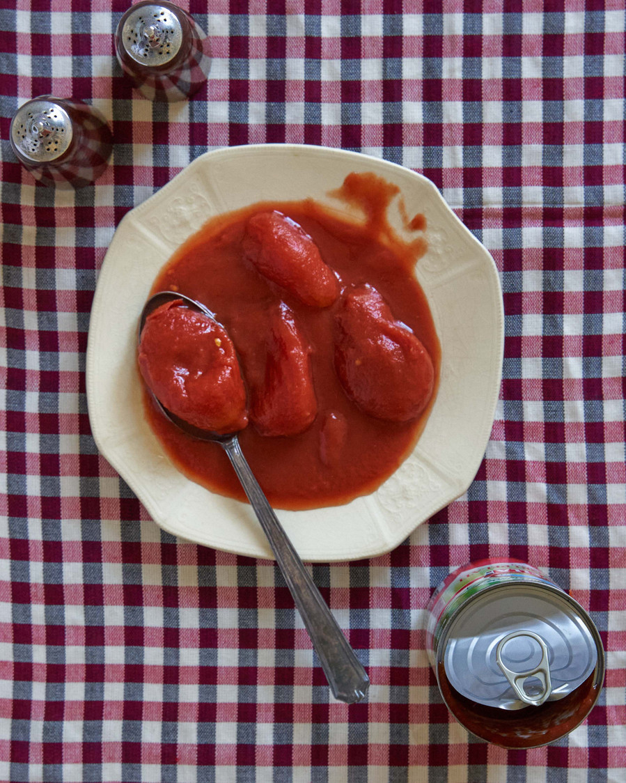 tomato soup on a checkered tablecloth