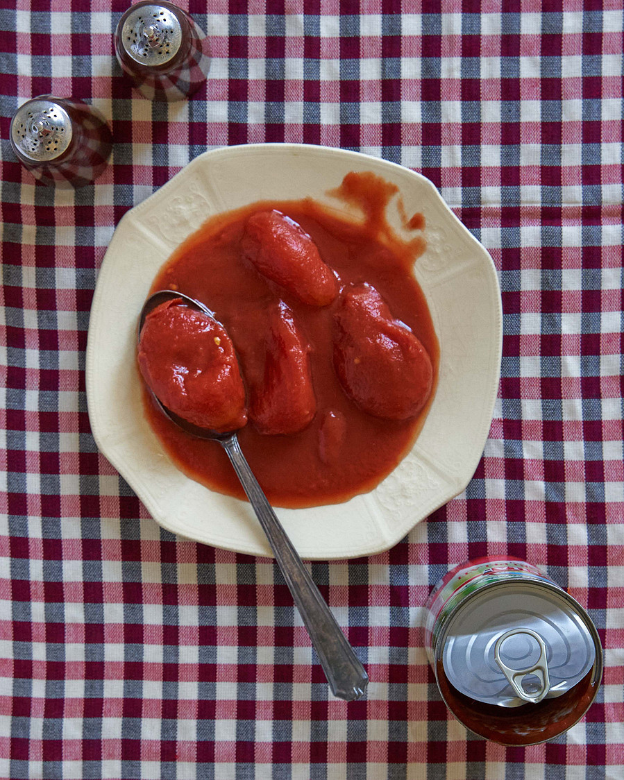 tomato soup on a checkered tablecloth
