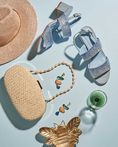 a flatlay of women accessories shoes bags and jewelry 