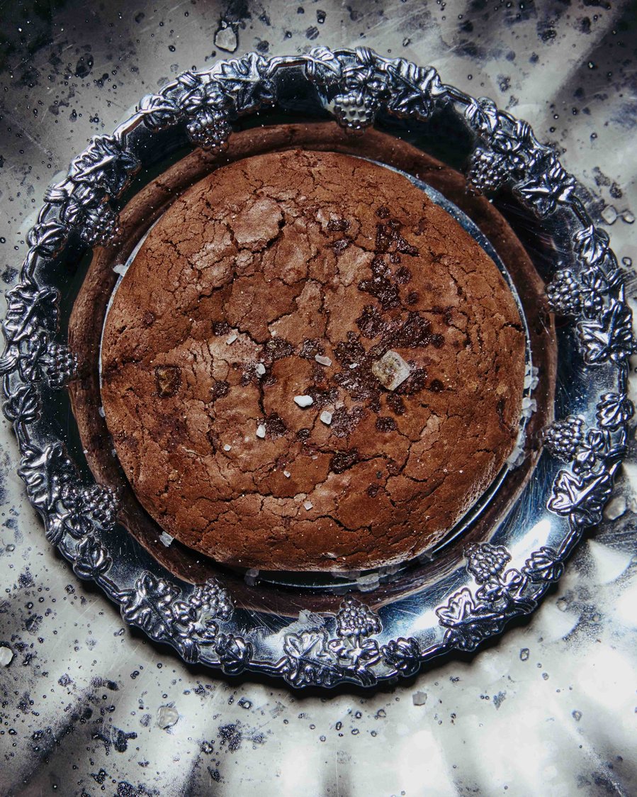 a chocolate cookie with salt on it