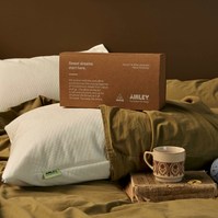 Bedroom scene with pillows, box and mug — Melbourne lifestyle interior photographer