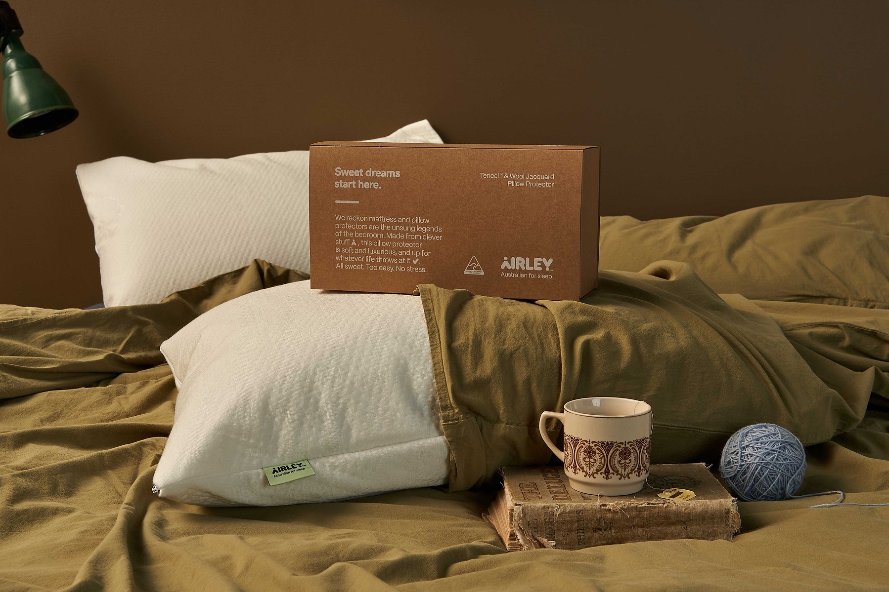 Bedroom scene with pillows, box and mug — Melbourne lifestyle interior photographer