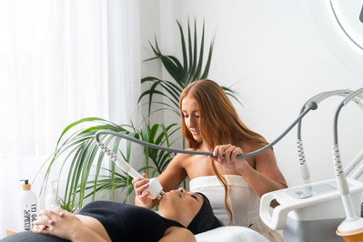 beautician in the salon during the procedure with the client