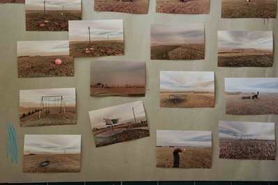 printed photos lying on the desk