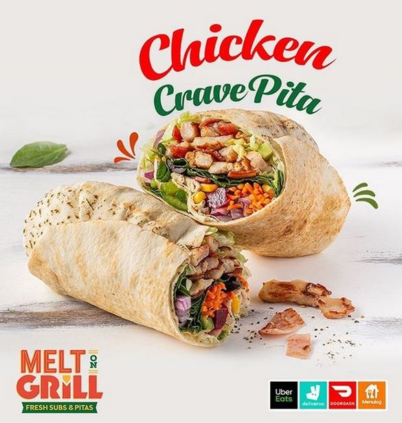 a poster of big pita with a lot of fillings 