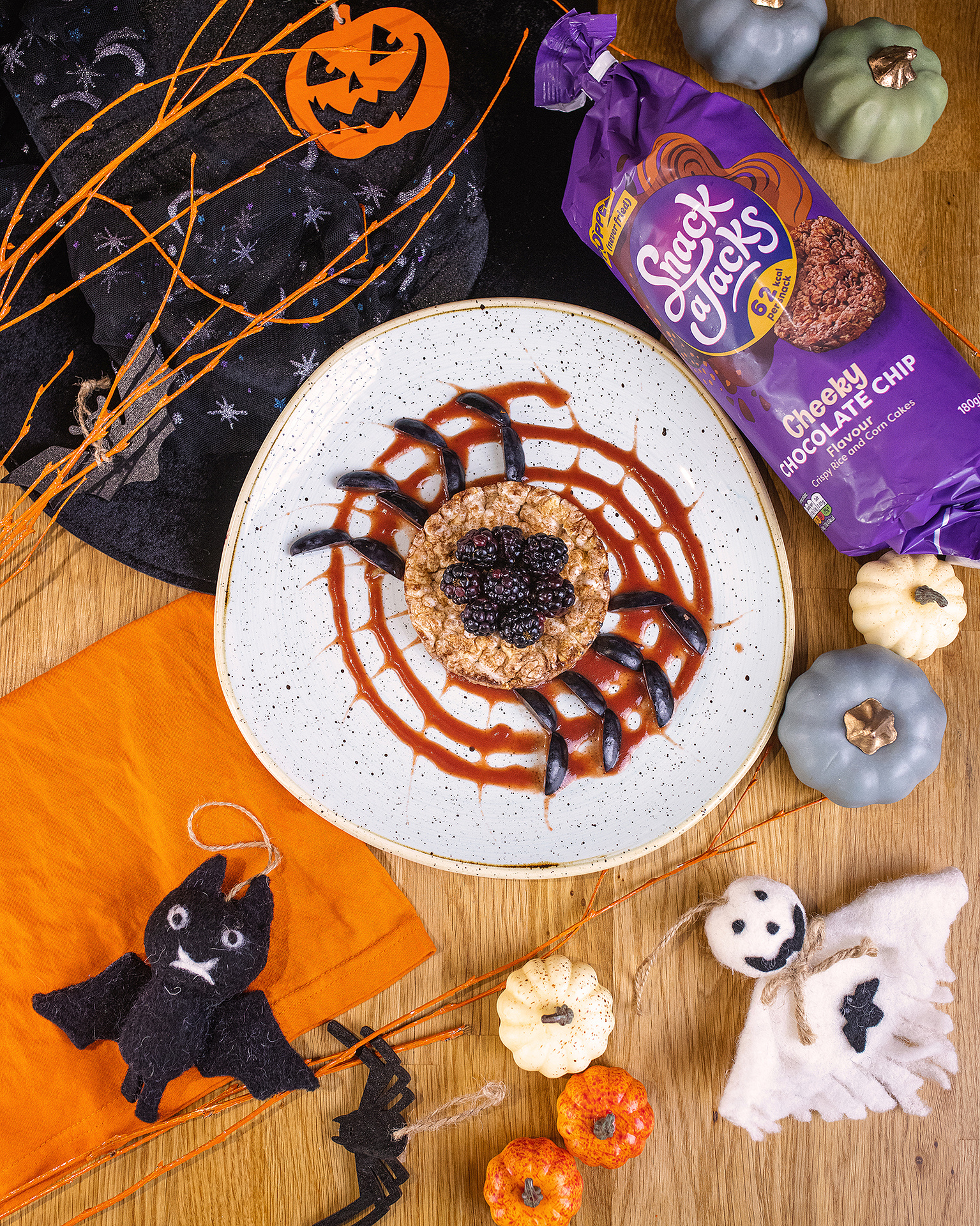 Fun, creative topping in the shape of a spider shot for Snack A Jacks by Georgie Glass Photography
