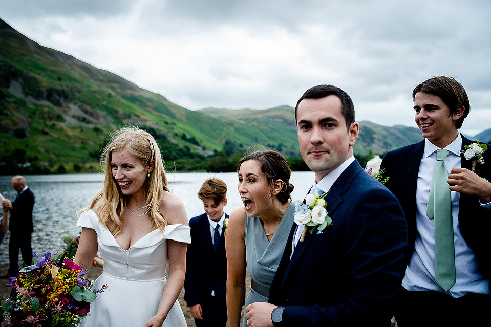Celebrations for a couples wedding in the Lake District, bride with bouquet, husband, bridesmaids and groomsmen - Georgie Glass Photography