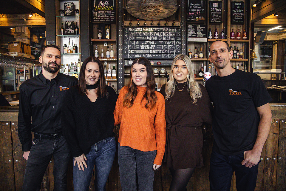 Georgie Glass Photography, product photographer, Manchester product photographer, Manchester portrait photographer, Beer Piper, Purple Riot team, group of men and women smiling having their photograph taken