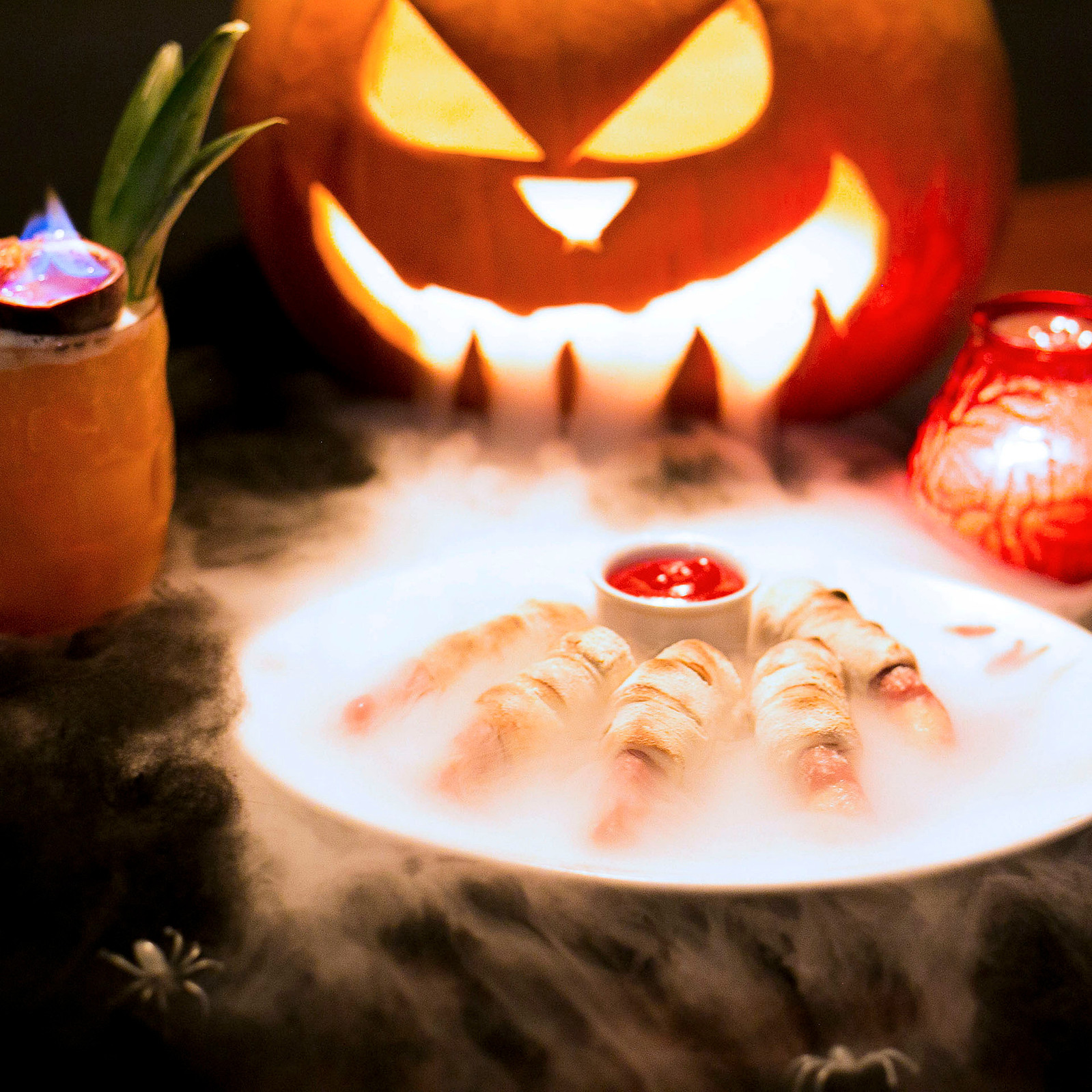 Fearsome pumpkin watching over bowl of snacks shaped to look like severed fingers shot for Dog Bowl by Georgie Glass Photography