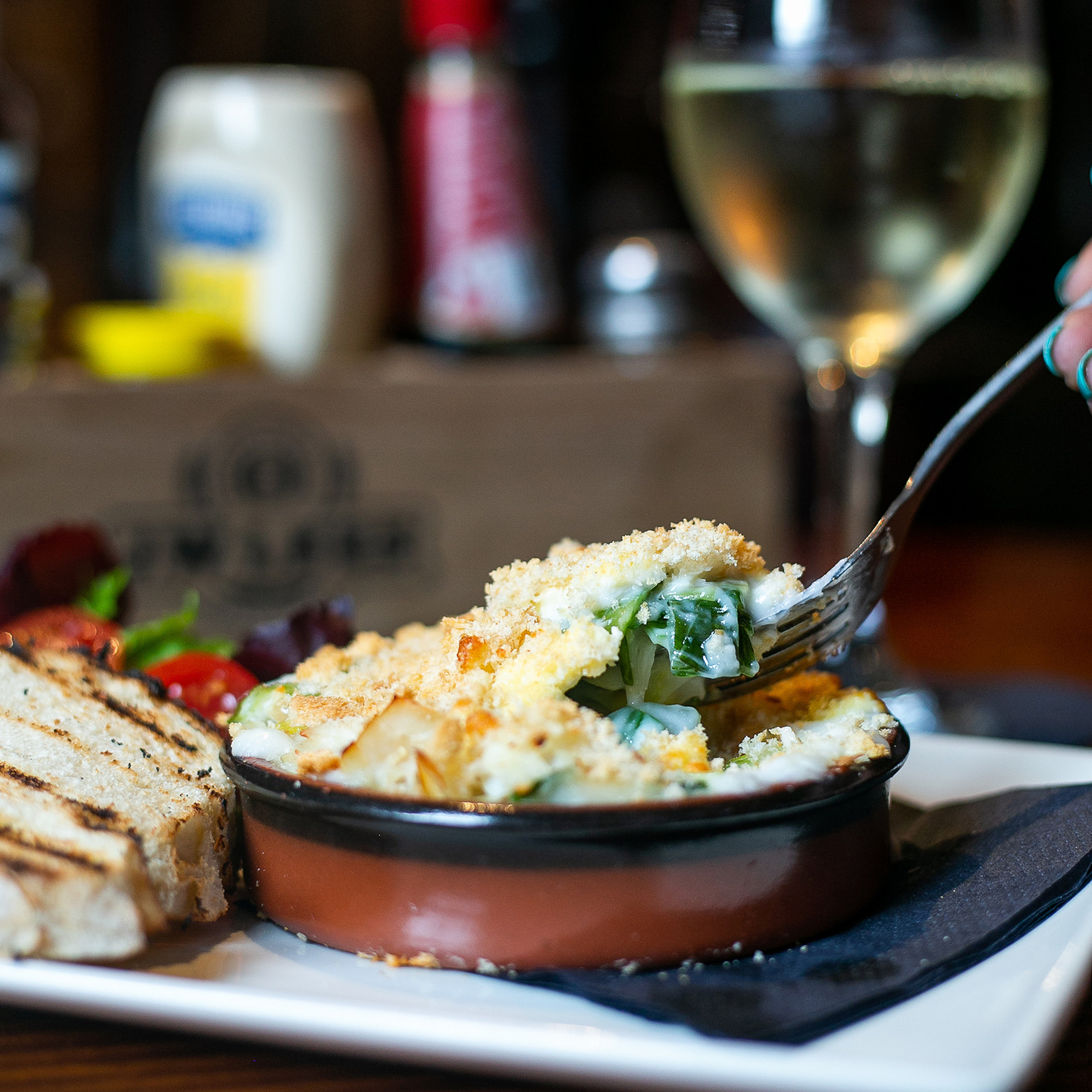 Fork cutting into fish pie shot for JW Lees by Georgie Glass Photography