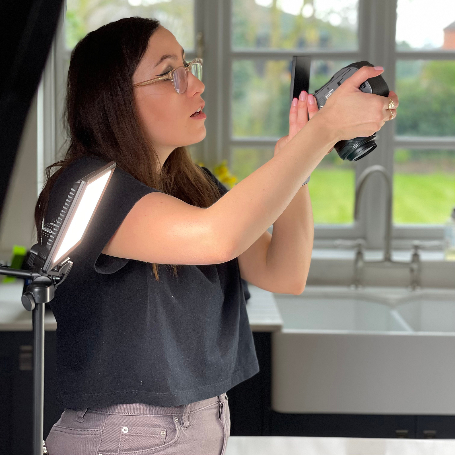 Portrait of photographer Georgie Glass Photographer behind the scenes on a photoshoot - Manchester based photographer and mental health advocate - We Are Hummingbird announcement