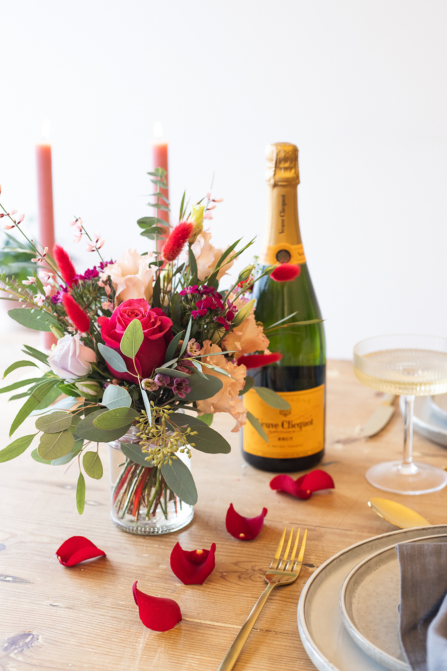 Georgie Glass Photography, food photographer, Manchester product photographer, The Flower Lounge, Didsbury, floral arrangements, Valentines day, rose petals scattered across a romantic dinner table with champagne