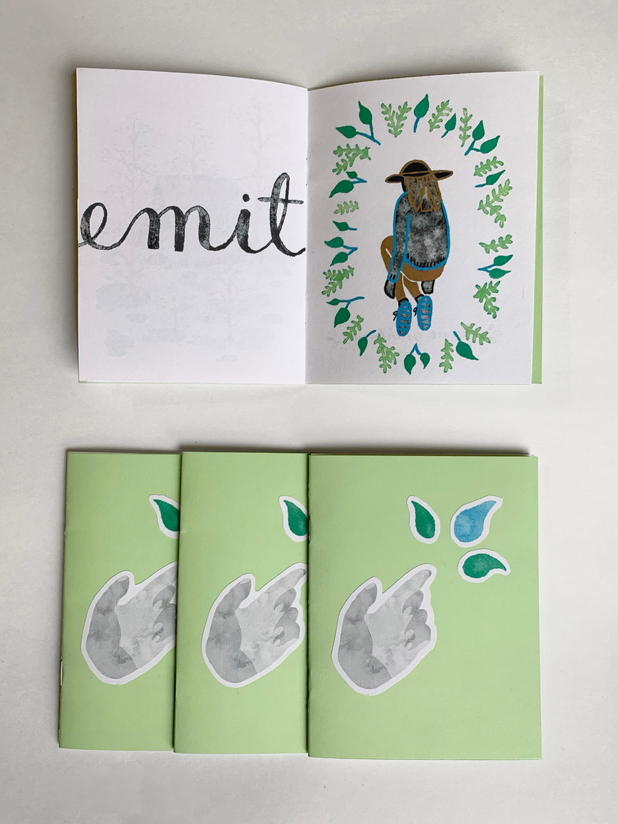 picture of an opened zine, under which there are three of the same zine closed