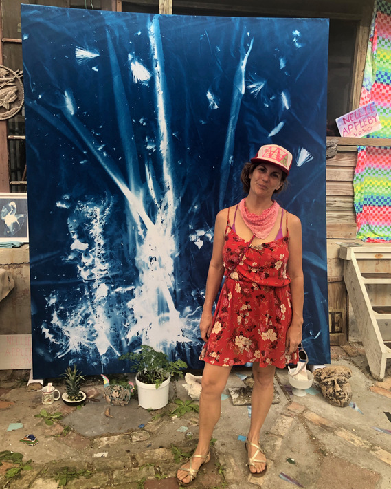 nellie appleby standing with large cyanotype open studio 2019