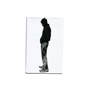 The back cover of the zine featuring a photograph of SoYoon's silhouette on a solid white background.