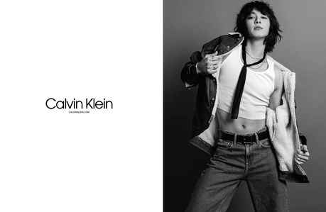 A Calvin Klein spread advertisement. featuring JungKook of BTS.