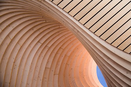 The beauty is in the details. Exquisite curved timber ceiling, a testament to craftsmanship, perfectly captured for architectural inspiration and material showcases. #InteriorDetails #ArchitecturalDesign #Woodwor. Architecture Photographer Basel Almisshal