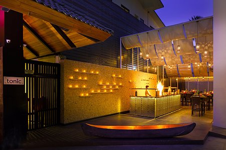 Under the glow of warm lighting and the crackle of an open fire, this chef&amp;amp;amp;amp;amp;amp;amp;amp;amp;amp;amp;amp;amp;#x27;s corner comes alive at night. Basel Almisshal captures the essence of authentic Indian cuisine being prepared, with flames dancing and casting a cozy, inviting ambiance. 