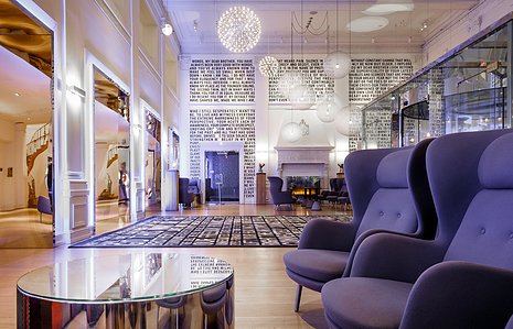 Warwick Hotel - The Warwick Hotel boasts a unique, stylish lobby, captured by Basel Almisshal. The space exudes elegance with its distinctive design and sophisticated ambiance, welcoming guests with a blend of classic charm and modern flair.