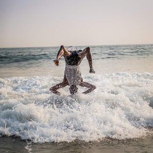 Beach goer dives into the water at Atican beach, Lagos ​