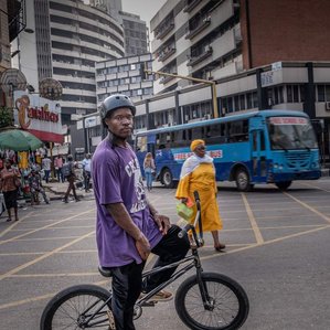 ​portrait of Nigerian BMX rider on the streets of Lagos Island.