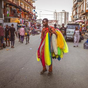 A trader selling sponges and bags at Balogun market, one of the busiest in Lagos.