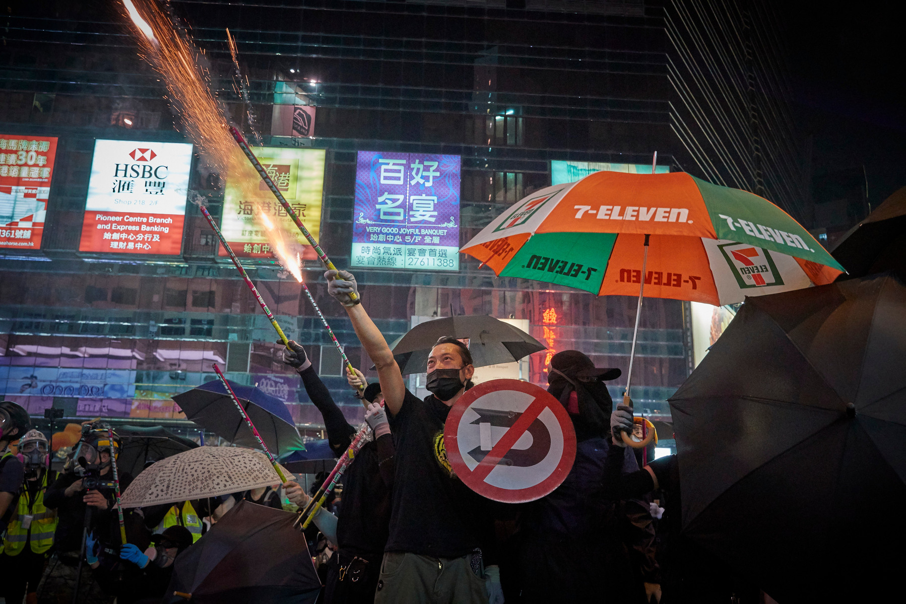 OCTOBER 1, 2019: A Pro-democracy protestors fire fireworks towards riot police during demonstrations in Mong Kok, Kowloon as protests to mark the 70th anniversary of the founding of the People's Republic of China turn violent