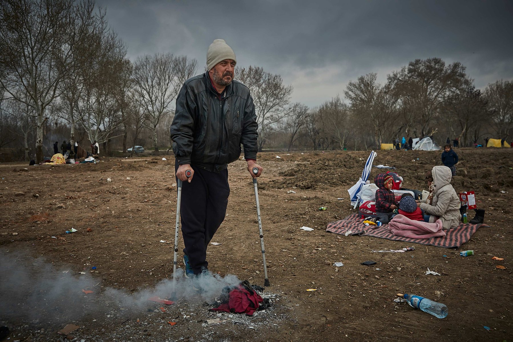 Refugees in a makeshift camp on the banks near the Edirne Old Bridge as they wait to cross into Greece and the European Union on March 05, 2020 in Edirne, Turkey.