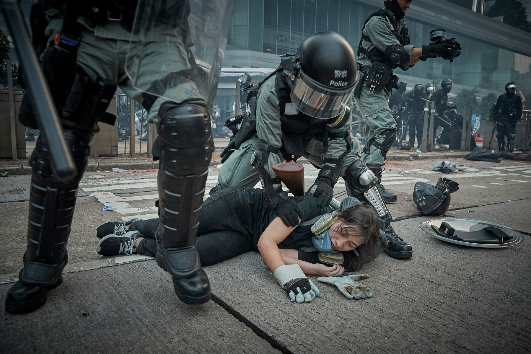 SEPTEMBER 29: Police restrain and arrest a protestor as protests turn violent during anti-government demonstrations near the Legco Government buildings, Admiralty, amidst rising tensions in Hong Kong.