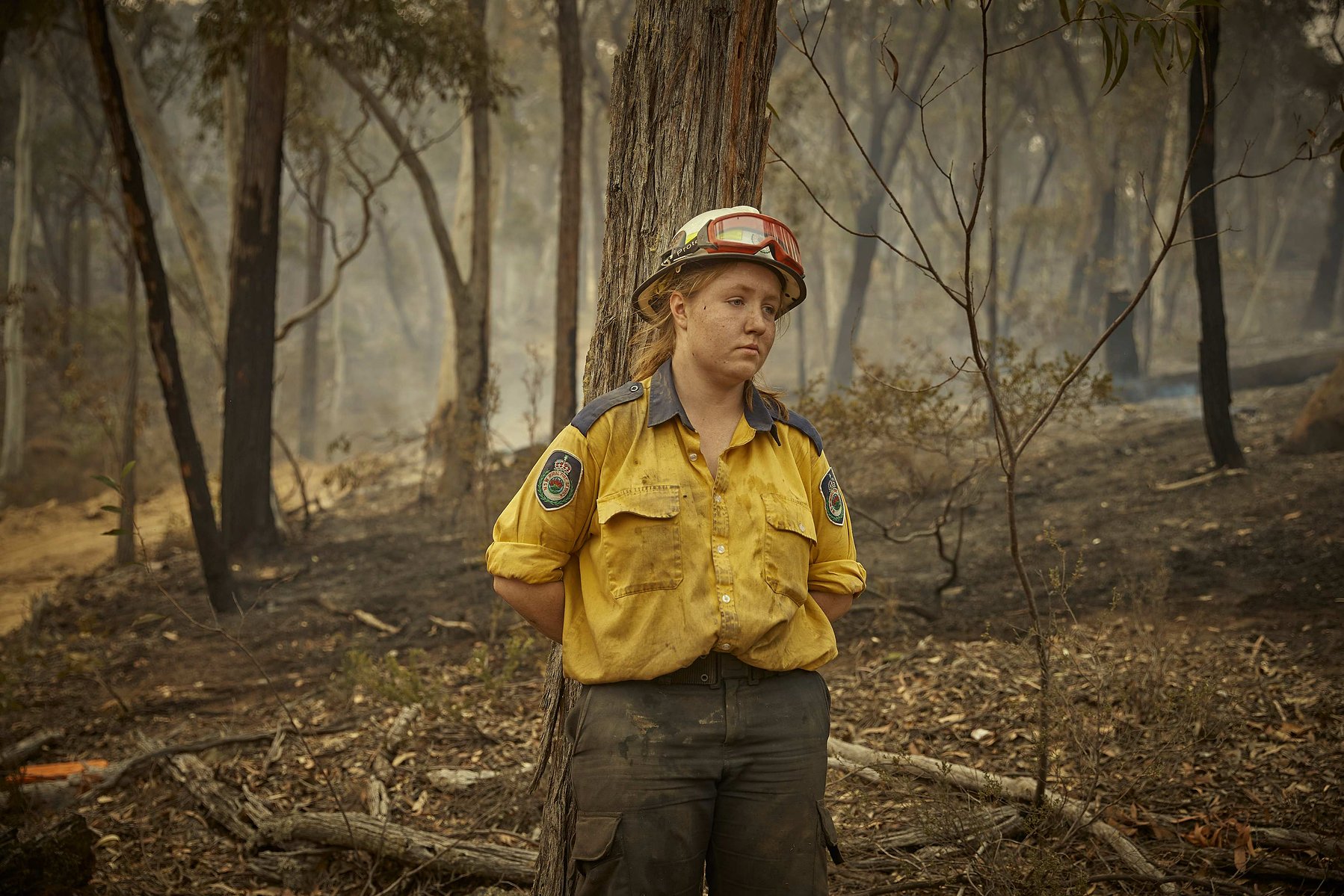 NUMERELLA, AUSTRALIA - JANUARY 14, 2020: A weary Rural Fire Service volunteer firefighter, takes a break fighting the bushfire on the outskirts of the small town of Numerella in New South Wales, on 14 January 2019.