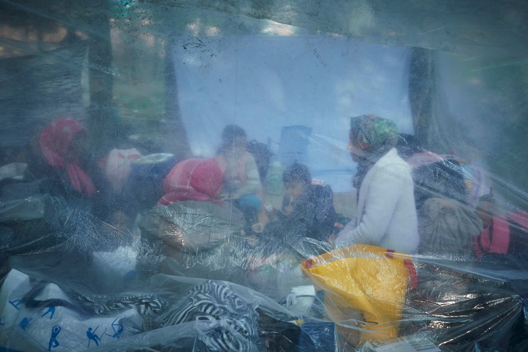 Refugees in a makeshift camp near the town of Edirne as they wait to cross into Greece and the European Union on March 06, 2020 in Edirne, Turkey.