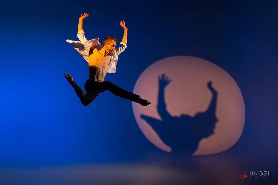 A dance photograph of Brian Simcoe, the principal dancer with Oregon Ballet Theater, dancing with the moon, by award-winning Portland dance photographer Jingzi Zhao.