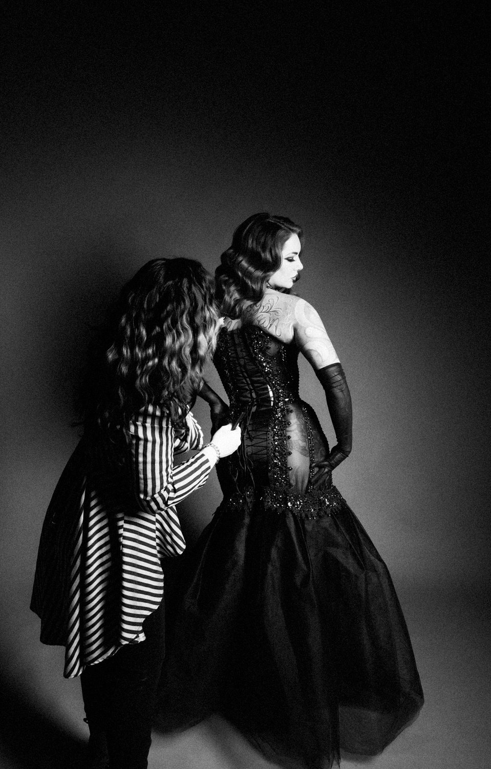 Creative team collaborating with model Cervena Fox during a photo session with NYC-based photographer MFFPHOTOGRAPHY.