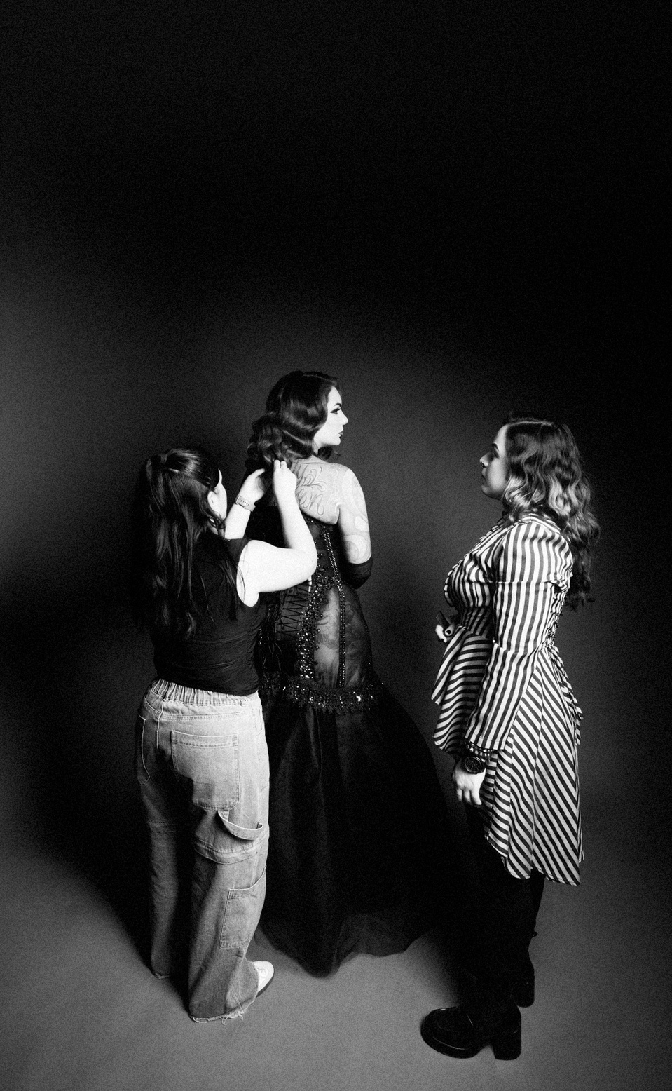 Creative team collaborating with model Cervena Fox during a photo session with NYC-based photographer MFFPHOTOGRAPHY.