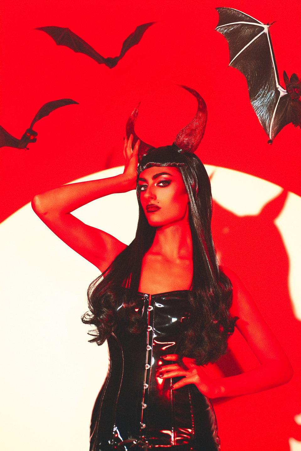 Bellatrix LeDevil rocking a devil-inspired set, shot by MFFPHOTOGRAPHY, a New York-based female photographer.