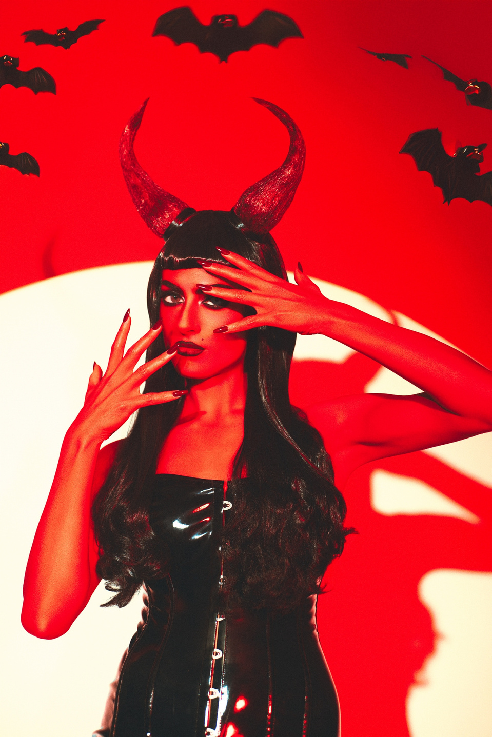 Bellatrix LeDevil rocking a devil-inspired set, shot by MFFPHOTOGRAPHY, a New York-based female photographer.