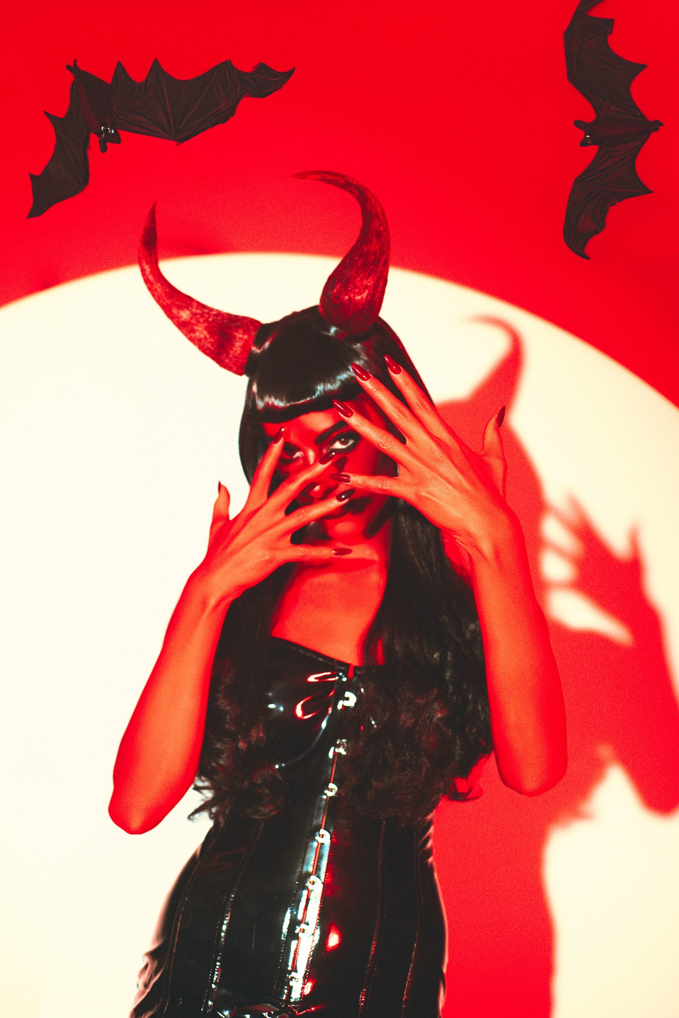 Bellatrix LeDevil rocking a devil-inspired set, shot by MFFPHOTOGRAPHY, a New York-based female photographer.