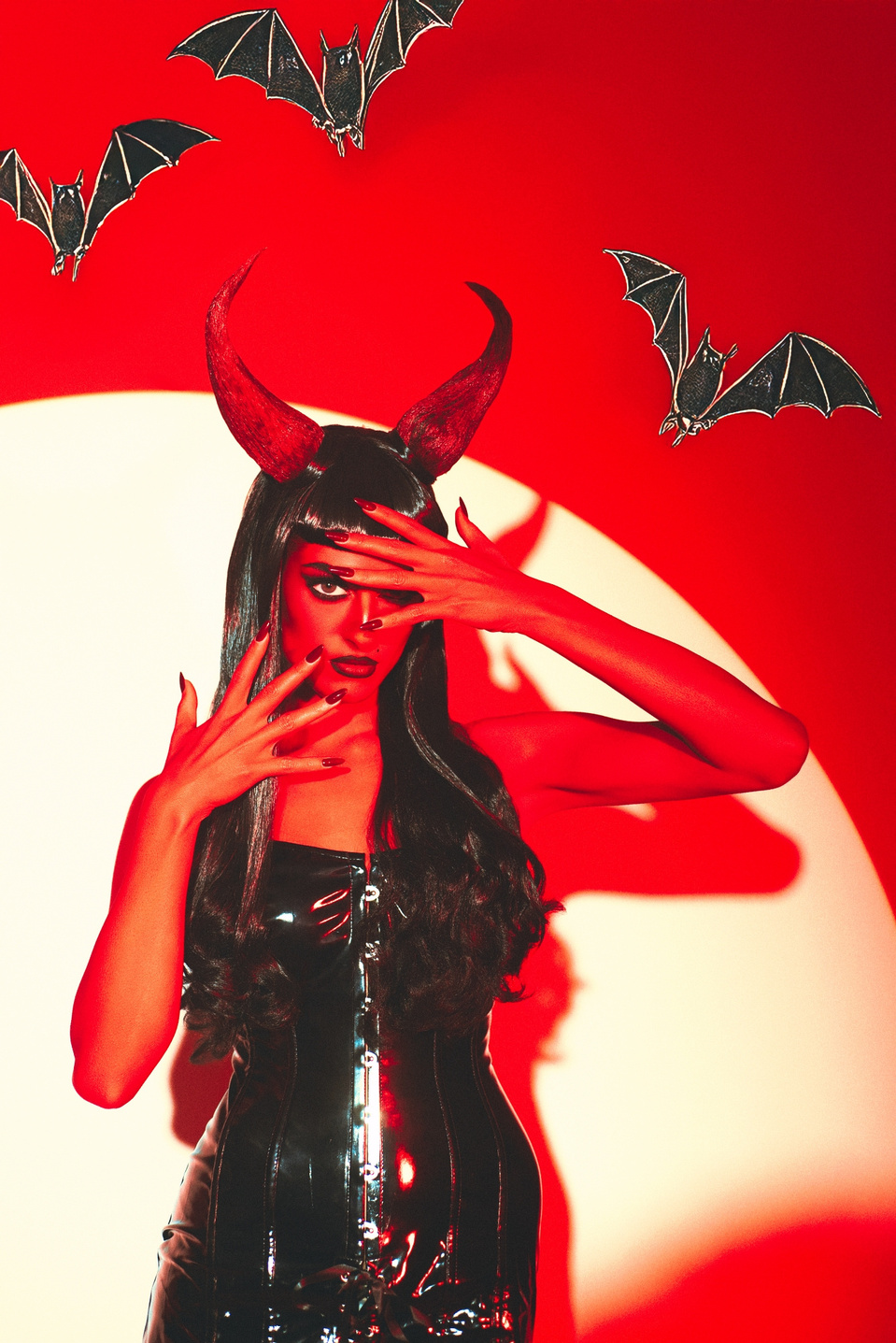 Bellatrix LeDevil rocking a devil-inspired set, shot by MFFPHOTOGRAPHY, a New York-based female photographer.