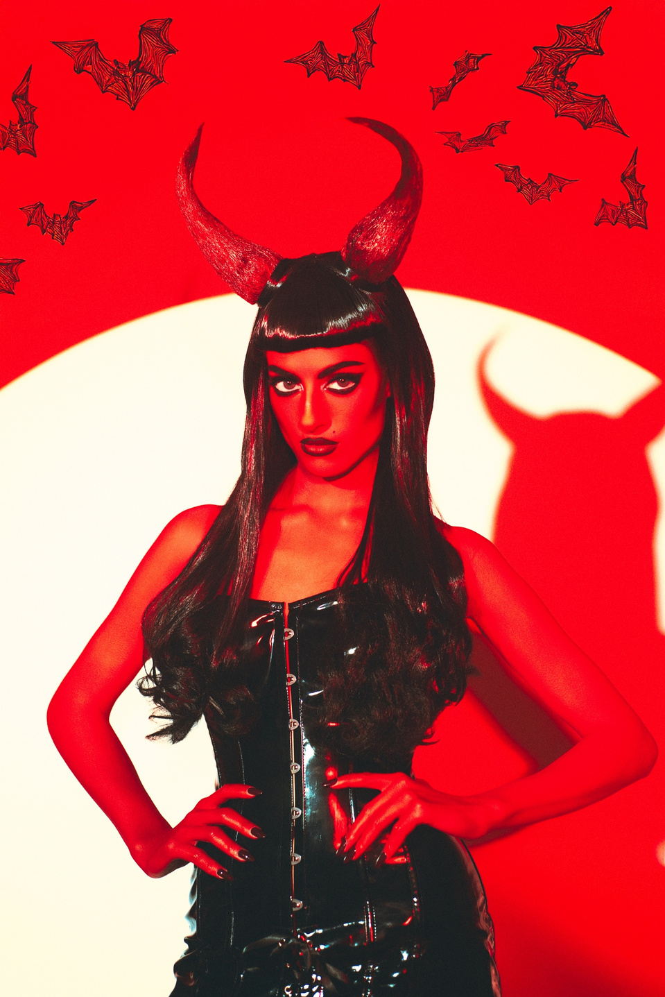 Bellatrix LeDevil rocking a devil-inspired set, shot by MFFPHOTOGRAPHY, a New York-based female photographer.