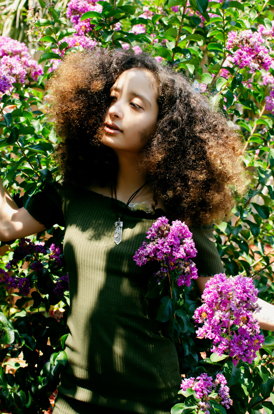 Female captured outdoors by NYC-based creative photographer MFFPHOTOGRAPHY.
