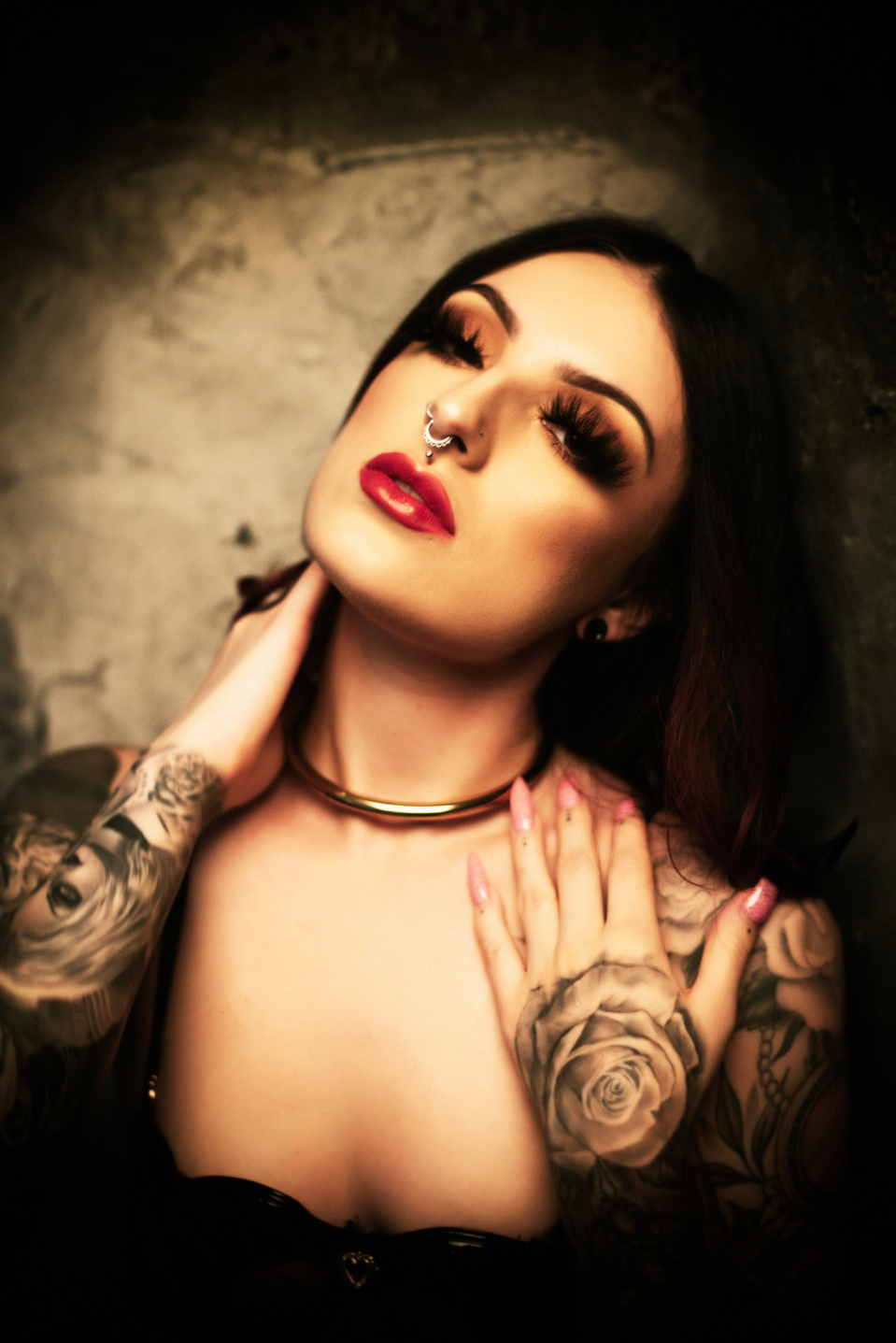 Model showcasing a gold necklace for Eternity Collars in a commercial studio session with NYC-based creative photographer MFFPHOTOGRAPHY.