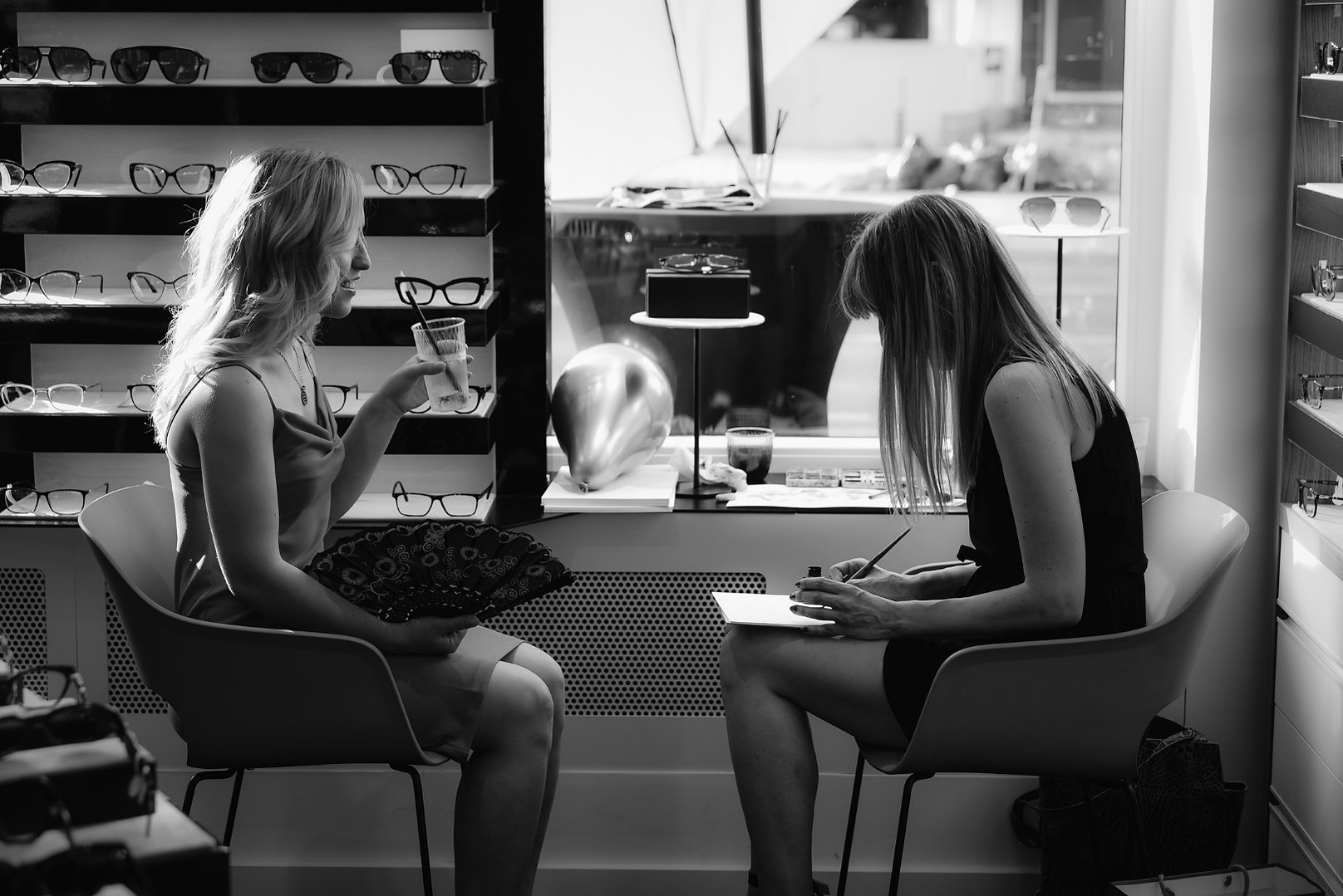 Illustration drawing a person at a promotional event black and white photo